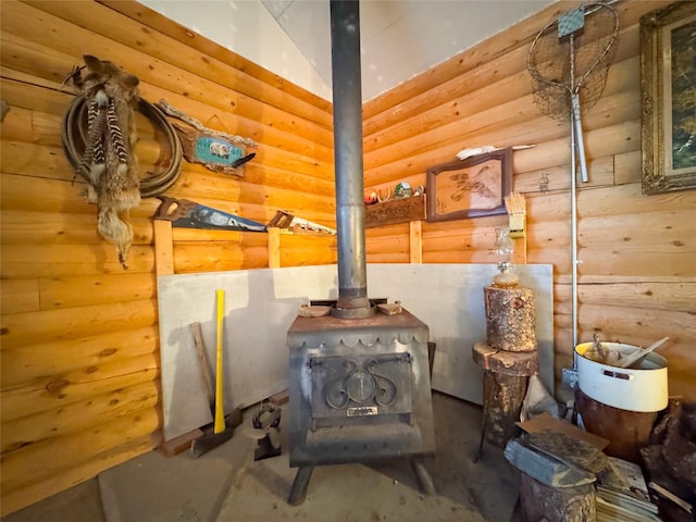 222 S Fork Ray Creek Rd, Townsend, MT 59644 - detailed view of a wood stove, concrete flooring, and log walls
