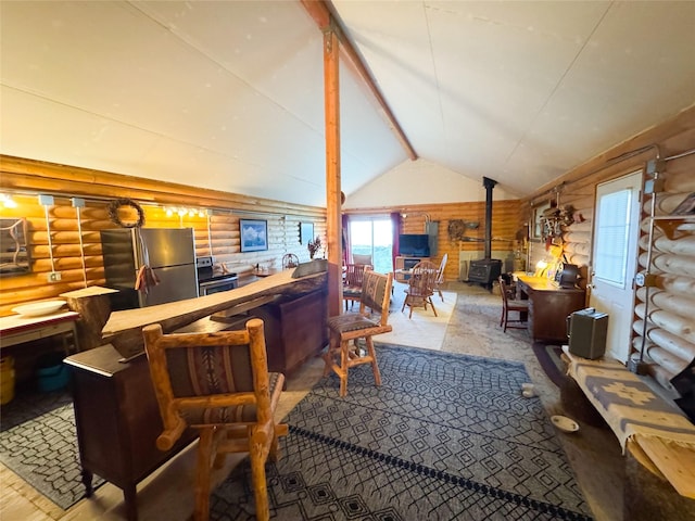 222 S Fork Ray Creek Rd, Townsend, MT 59644 - living room featuring log walls and a wood stove