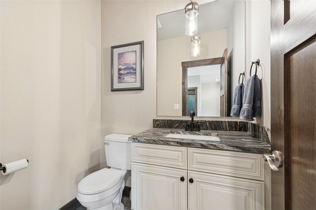 1066 Mill Creek Drive Mill Creek Drive, Bigfork, MT 59911 - half bathroom with toilet and vanity