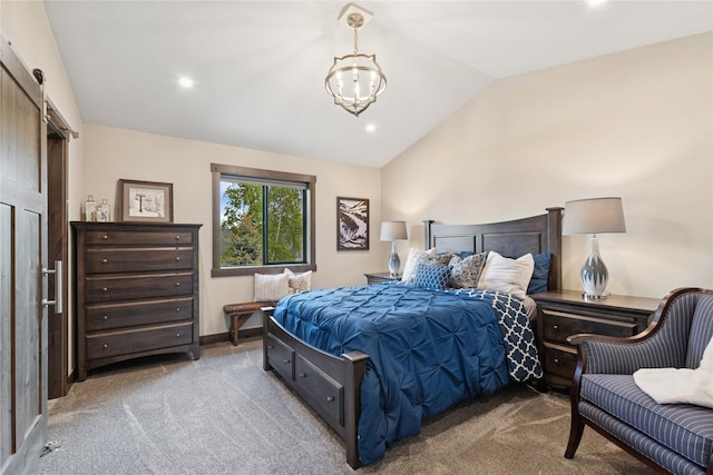 1066 Mill Creek Drive Mill Creek Drive, Bigfork, MT 59911 - carpeted bedroom featuring lofted ceiling, a chandelier, a barn door, and recessed lighting