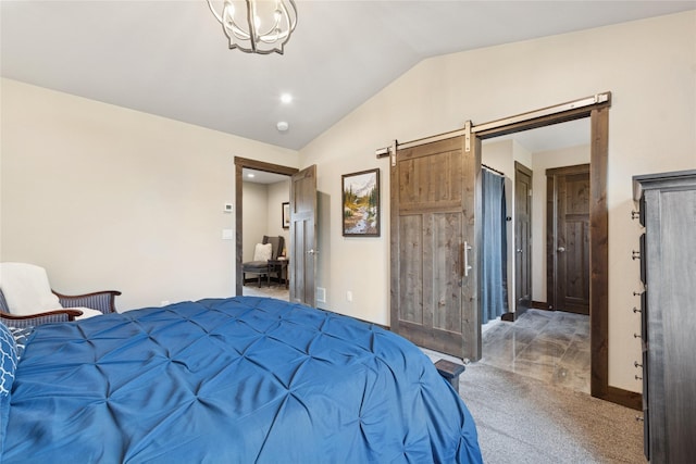 1066 Mill Creek Drive Mill Creek Drive, Bigfork, MT 59911 - bedroom featuring vaulted ceiling, a barn door, and carpet floors