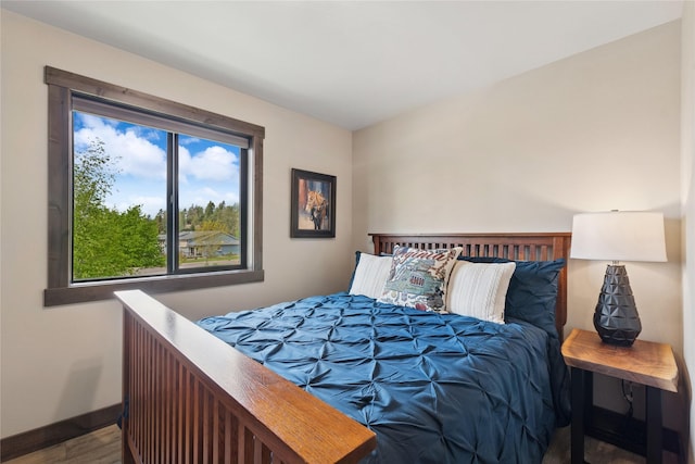 1066 Mill Creek Drive Mill Creek Drive, Bigfork, MT 59911 - bedroom featuring baseboards and wood finished floors