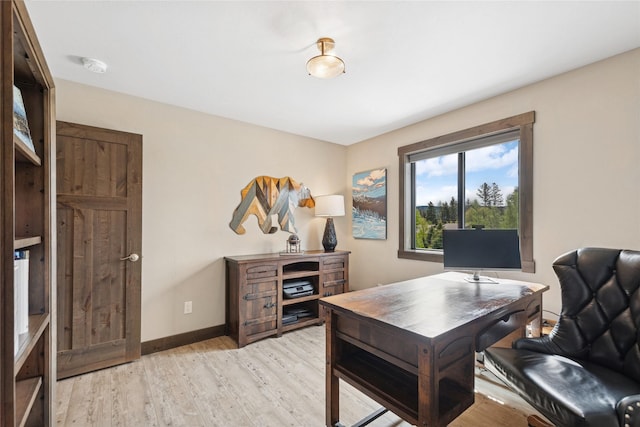 1066 Mill Creek Drive Mill Creek Drive, Bigfork, MT 59911 - office area with light wood-style floors and baseboards