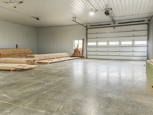 89 Wild Rose Trl, Roberts, MT 59070 - garage featuring a garage door opener