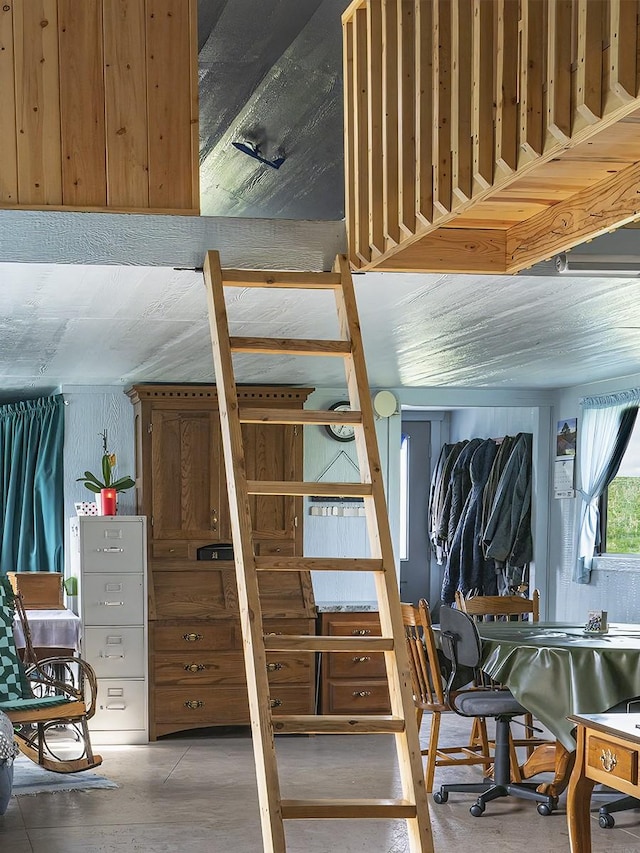 89 Wild Rose Trl, Roberts, MT 59070 - bedroom featuring concrete floors and an office area