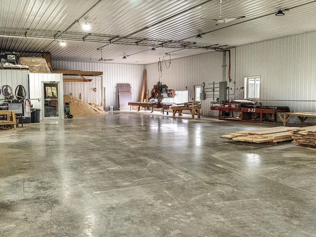 89 Wild Rose Trl, Roberts, MT 59070 - garage featuring a workshop area and metal wall