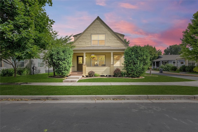 2795 Renae Ct, Missoula, MT 59804 - view of front of home featuring a porch and a front lawn