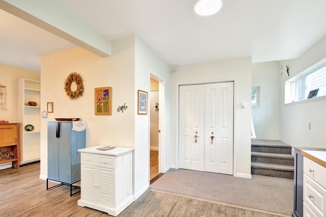 2795 Renae Ct, Missoula, MT 59804 - kitchen featuring light wood finished floors, white cabinets, and light countertops