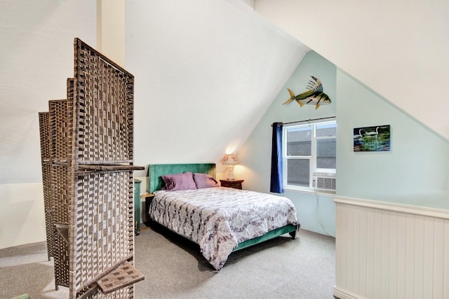 2795 Renae Ct, Missoula, MT 59804 - carpeted bedroom with lofted ceiling and wainscoting