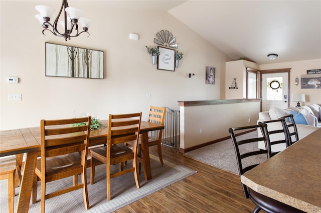 89 Alyvia Ln, Butte, MT 59701 - dining area with wood finished floors, a chandelier, and lofted ceiling