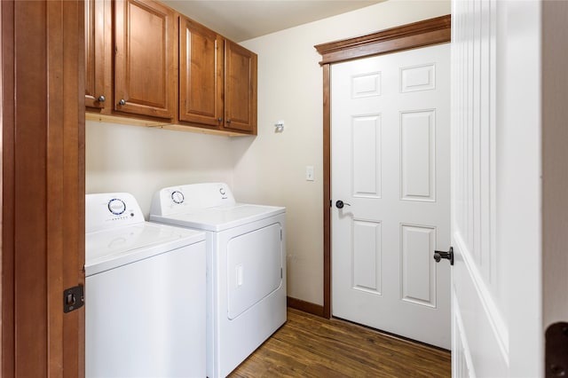 89 Alyvia Ln, Butte, MT 59701 - laundry area featuring independent washer and dryer, cabinet space, dark wood finished floors, and baseboards