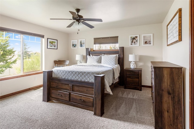 89 Alyvia Ln, Butte, MT 59701 - bedroom with baseboards, carpet, and a ceiling fan