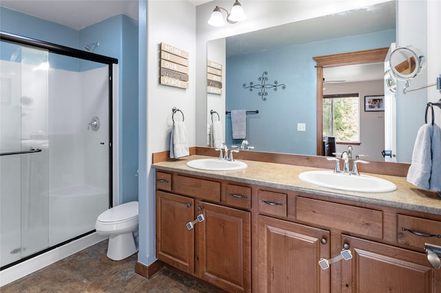 89 Alyvia Ln, Butte, MT 59701 - full bathroom with a shower stall, double vanity, and toilet