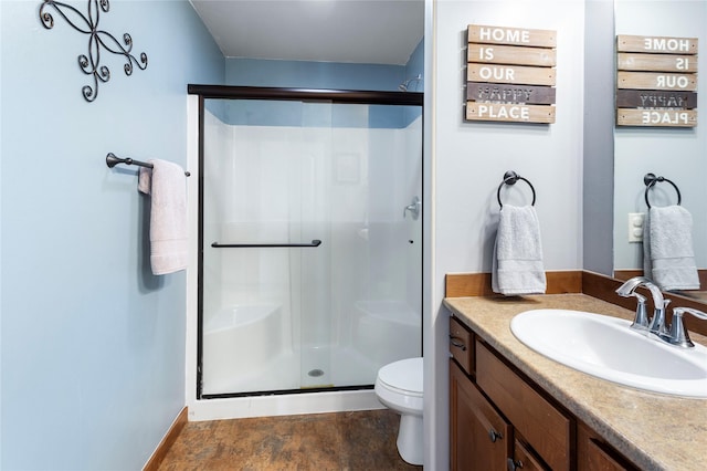 89 Alyvia Ln, Butte, MT 59701 - full bath featuring a shower stall, vanity, and toilet
