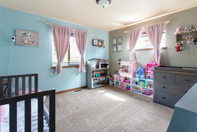 89 Alyvia Ln, Butte, MT 59701 - carpeted bedroom featuring baseboards