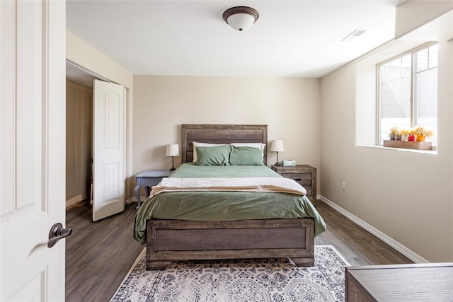 89 Alyvia Ln, Butte, MT 59701 - bedroom featuring baseboards and wood finished floors
