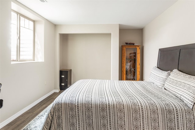 89 Alyvia Ln, Butte, MT 59701 - bedroom featuring dark wood finished floors and baseboards