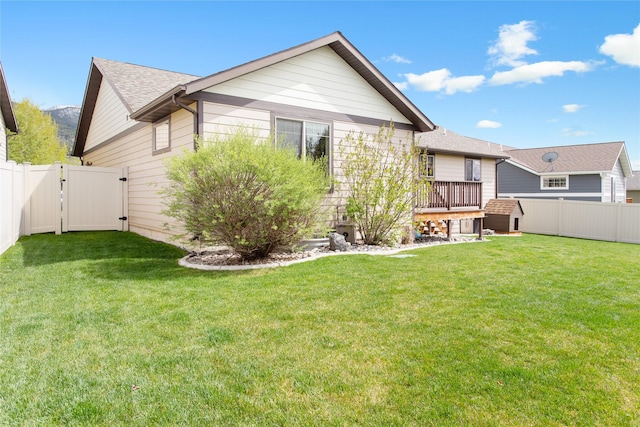 89 Alyvia Ln, Butte, MT 59701 - rear view of house featuring a gate and a shingled roof