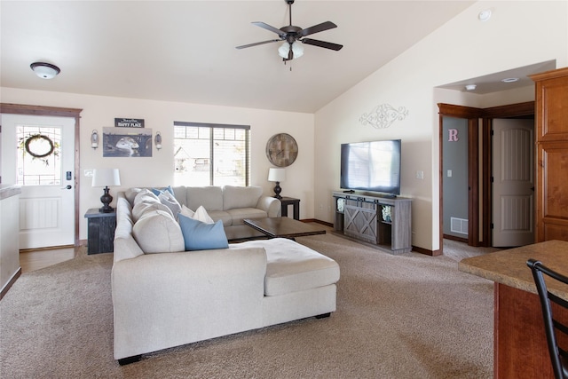 89 Alyvia Ln, Butte, MT 59701 - carpeted living area featuring ceiling fan, plenty of natural light, baseboards, and high vaulted ceiling