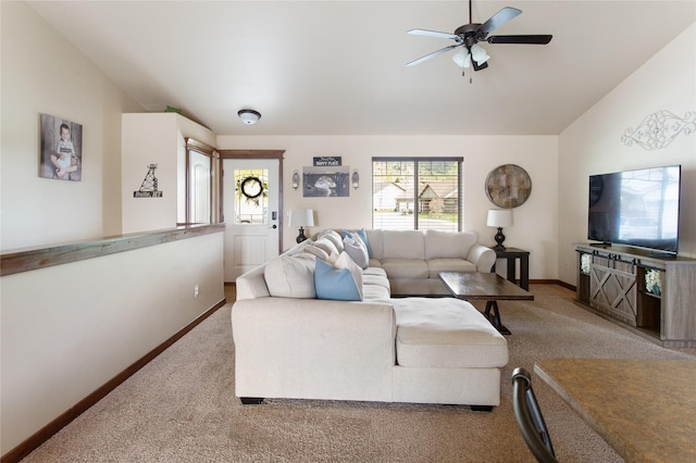 89 Alyvia Ln, Butte, MT 59701 - carpeted living room with baseboards and ceiling fan