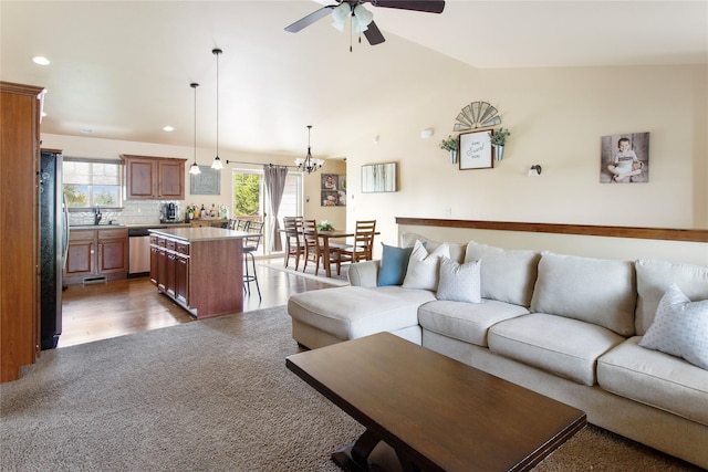 89 Alyvia Ln, Butte, MT 59701 - living room with a ceiling fan, recessed lighting, lofted ceiling, and carpet flooring