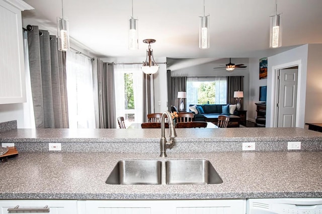 883 Saint Andrews Dr, Columbia Falls, MT 59912 - kitchen with a sink, healthy amount of natural light, open floor plan, and a ceiling fan