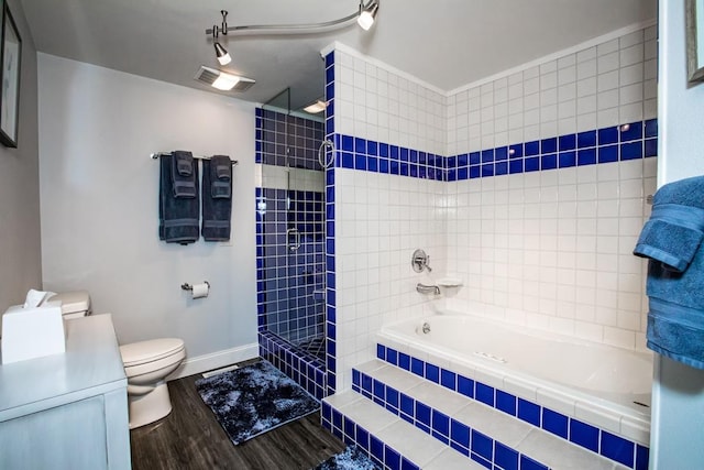 883 Saint Andrews Dr, Columbia Falls, MT 59912 - bathroom featuring wood finished floors, toilet, vanity, and baseboards