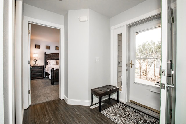 883 Saint Andrews Dr, Columbia Falls, MT 59912 - doorway with dark wood-style flooring and baseboards