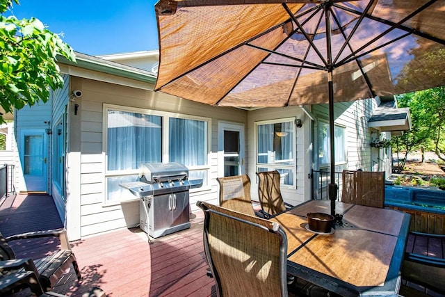 883 Saint Andrews Dr, Columbia Falls, MT 59912 - wooden terrace with outdoor dining area and a grill