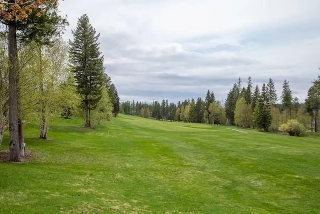 883 Saint Andrews Dr, Columbia Falls, MT 59912 - view of home's community with a lawn