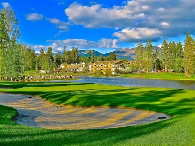 883 Saint Andrews Dr, Columbia Falls, MT 59912 - view of property's community with a yard and a water and mountain view
