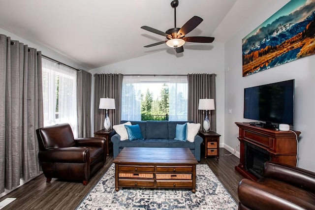 883 Saint Andrews Dr, Columbia Falls, MT 59912 - living area with lofted ceiling, wood finished floors, a ceiling fan, and baseboards