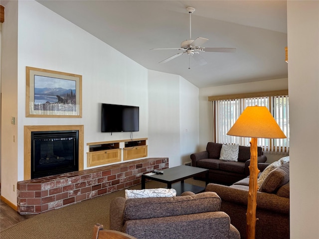 883 Saint Andrews Dr, Columbia Falls, MT 59912 - living area with lofted ceiling, a ceiling fan, a brick fireplace, and wood finished floors