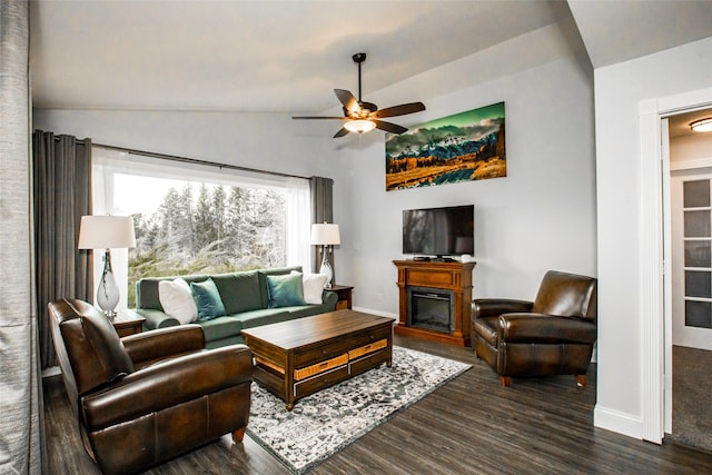 883 Saint Andrews Dr, Columbia Falls, MT 59912 - living area with a ceiling fan, dark wood-style flooring, a fireplace, baseboards, and lofted ceiling