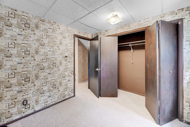 15 Vigilante Trl, Clancy, MT 59634 - unfurnished bedroom with a closet, a drop ceiling, carpet flooring, and baseboards