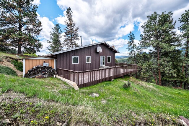 15 Vigilante Trl, Clancy, MT 59634 - view of property exterior featuring a wooden deck
