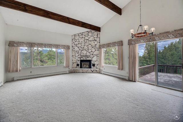 15 Vigilante Trl, Clancy, MT 59634 - unfurnished living room featuring a baseboard heating unit, a chandelier, carpet floors, plenty of natural light, and beam ceiling