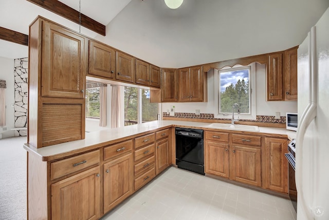 15 Vigilante Trl, Clancy, MT 59634 - kitchen with black dishwasher, a sink, electric stove, light countertops, and brown cabinets