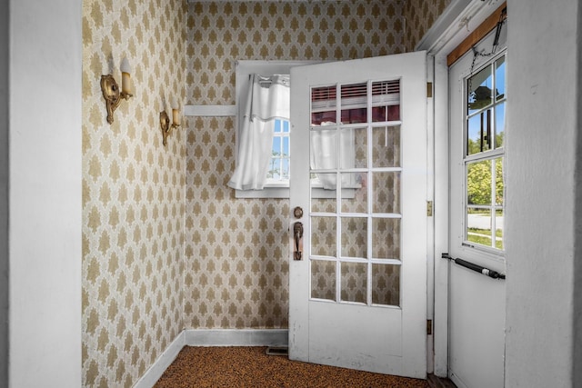 414 Somers Ave, Whitefish, MT 59937 - doorway with wallpapered walls and baseboards