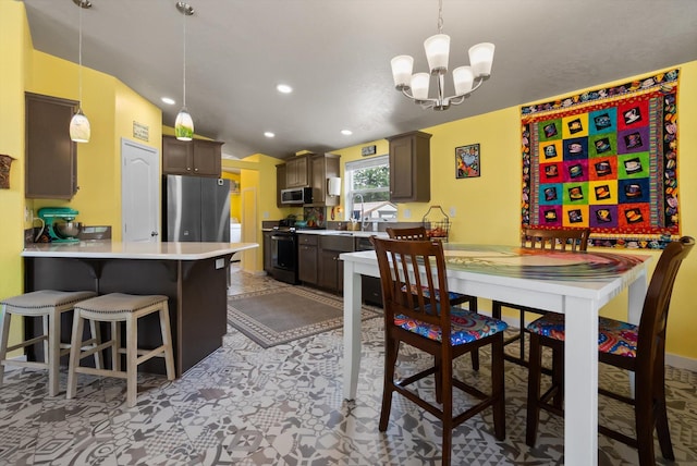 245 Blanchard Lake Rd, Whitefish, MT 59937 - dining room featuring a chandelier and recessed lighting