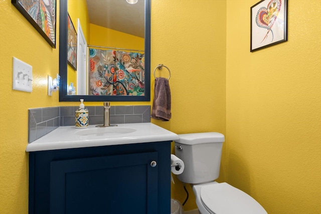 245 Blanchard Lake Rd, Whitefish, MT 59937 - bathroom with vanity, tasteful backsplash, and curtained shower