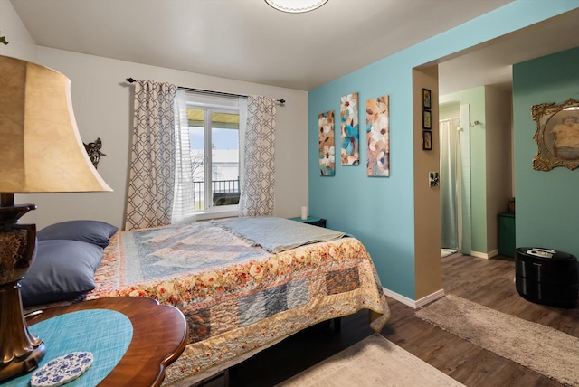 245 Blanchard Lake Rd, Whitefish, MT 59937 - bedroom with wood finished floors and baseboards