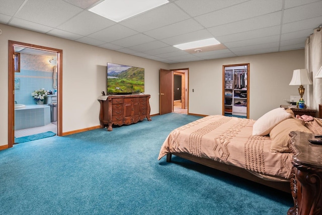 245 Blanchard Lake Rd, Whitefish, MT 59937 - bedroom with a paneled ceiling, carpet flooring, ensuite bath, and a walk in closet