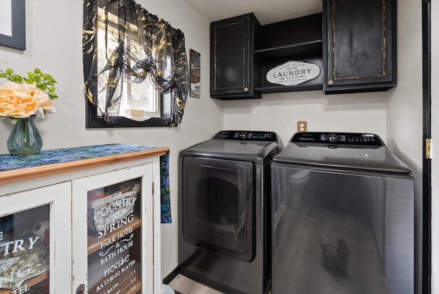 245 Blanchard Lake Rd, Whitefish, MT 59937 - washroom featuring separate washer and dryer and cabinet space
