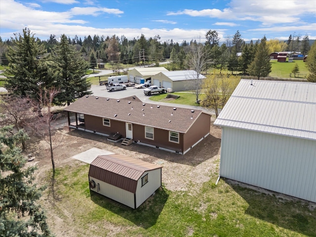 245 Blanchard Lake Rd, Whitefish, MT 59937 - view of subject property with a tree filled landscape