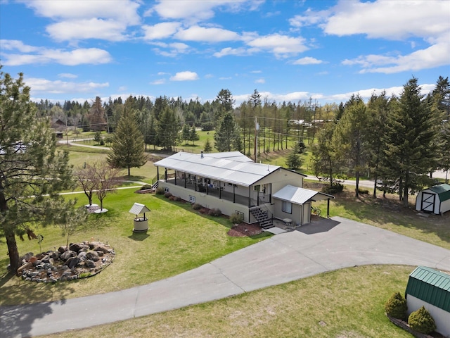245 Blanchard Lake Rd, Whitefish, MT 59937 - aerial view of property and surrounding area with a tree filled landscape