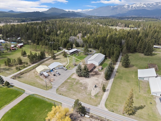 245 Blanchard Lake Rd, Whitefish, MT 59937 - aerial overview of property's location featuring a heavily wooded area and mountains
