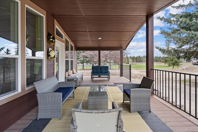 245 Blanchard Lake Rd, Whitefish, MT 59937 - deck featuring an outdoor living space