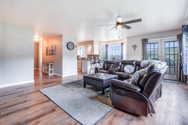 30 Knapp Ln, Kalispell, MT 59901 - living area featuring ceiling fan, light wood finished floors, and baseboards