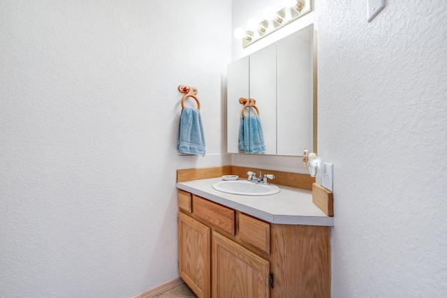 30 Knapp Ln, Kalispell, MT 59901 - bathroom featuring vanity and a textured wall
